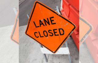 Lane closed road sign