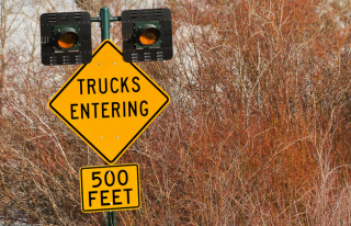 Trucks entering sign