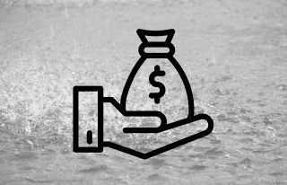 Hand offering money, background shows heavy rain